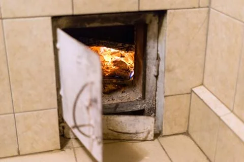 Fire in the stove for the bath 库存照片