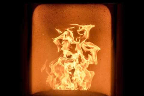 Fire in stove Stock Photos