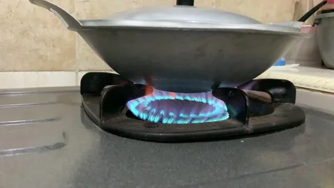 Fire in a stove with a pot for cooking Stock Footage 282894848
