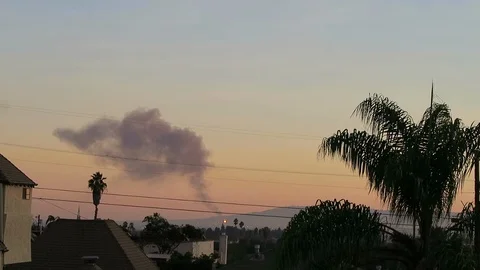 Fire at sunset Video stock 112856386