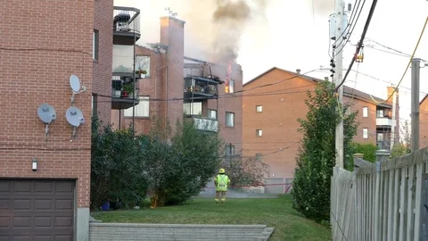 Fire Supervisor Watching As They Work On... | Stock Video | Pond5