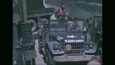 FIRE SUPPORT BASE DANGER - 1969: Redeployment to Dong Tam — gun-jeep and APC Stock Footage 341698255