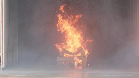 Fire Suppression System Engaged to Control Flames Stock Footage 301000756