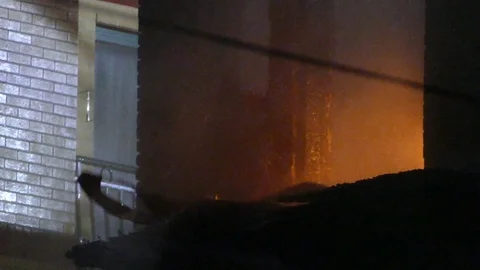 Fire Surging Out Of Window From Burning Structure Video stock 82798738