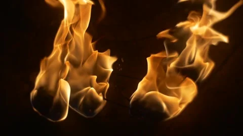 Fire is Swaying at The Wind Multiply Fire Torches Are Burning Slow Motion Stock Footage 58643530