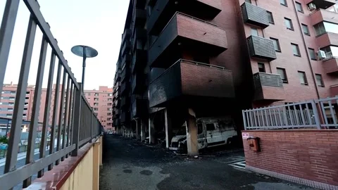 Fire on Taboada Street extinguished after 20 cars burn, no structural damage rep Vídeos de archivo 313903956