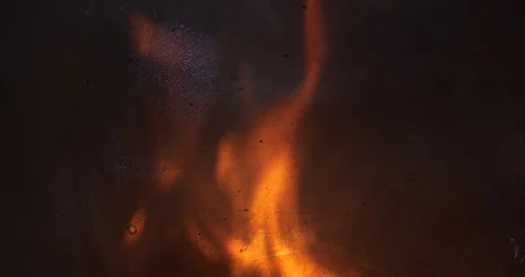 Fire through glass. view of flame through glass. fireplace flame background Stock Footage 304391500