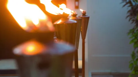 Fire torch line - close up - soft focus 스톡 동영상 68997062