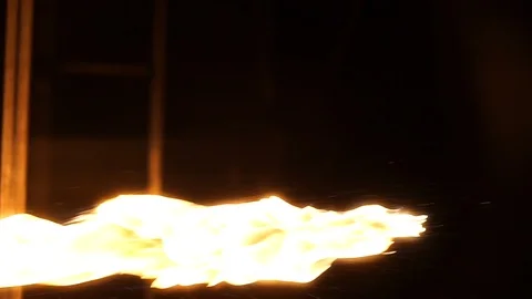 Fire trails spurt through the air in slow motion ending with a large blast Stock Footage 103660256