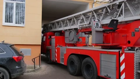 Fire truck arrives to rescue problem and difficulty of arrival. City scene. Stock Footage 151017511