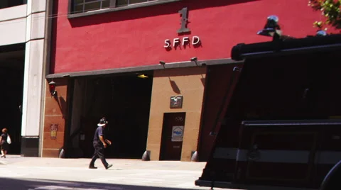 Fire Truck Backs into Fire Station Stock Footage 62898850