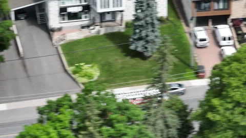 Fire truck driving through community close up streets Stock Footage 330892264