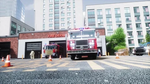 Fire truck quickly leaves for the call, garage door at fire department opens. Stock-Footage 333418625