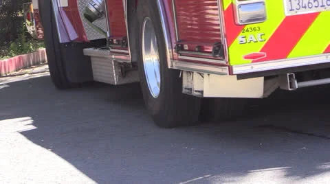Fire truck returning to station Stock Footage 25679587