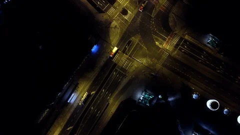 Fire trucks crossing intersection in the night. Fire truck crews. Aerial Stock Footage 88132241