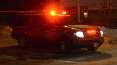 Fire Trucks in distance with flashing lights, heavy snow 2 Stock Footage 36630664