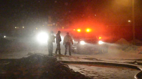 Fire Trucks in distance with flashing lights, heavy snow Stock Footage 36630718