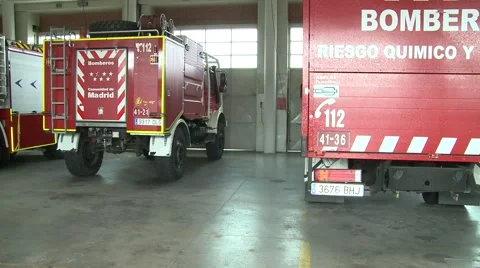Fire trucks in a garage Stock Footage 54685546