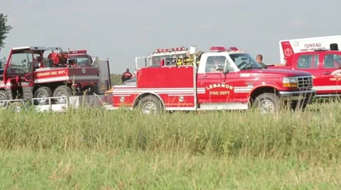 Fire Trucks Leaving Scene Stock-Footage 12532987