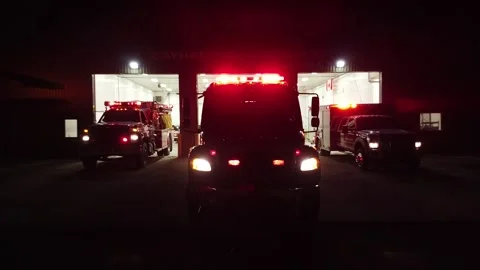Fire trucks leaving the station Stock Footage 250637077