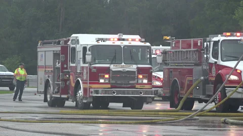 Fire Trucks On Rainy Day 스톡 동영상 48679507