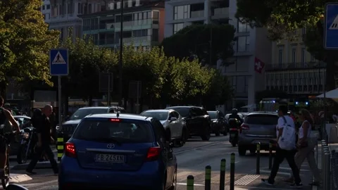 Fire trucks speeding through the city traffic with flashing lights. Stock Footage 347283221