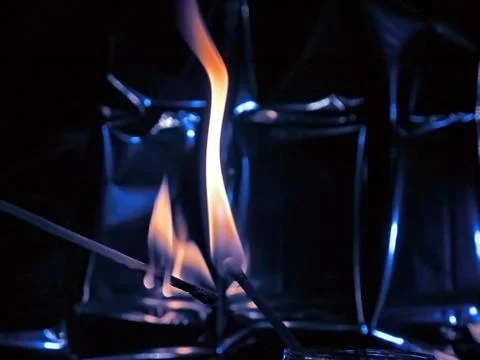 The fire of two burning matches in close up and close, Stock Photos