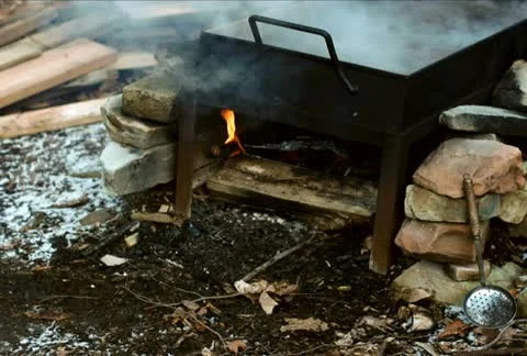 Fire under evaporation Pan NTSC Stock Footage 10808390