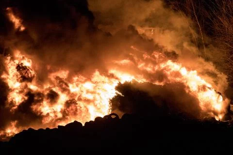 A fire in a used tire facility Stock Photos