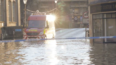 Fire vehicle driving through flood water Stock Footage 33754251