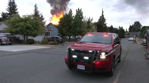 FIRE VEHICLE AT HOUSE FIRE Stock Footage 247342603