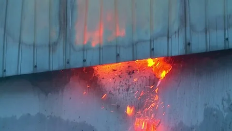 Fire. Warehouse. Wall. Metal. Red hot. Stock Footage 72913101