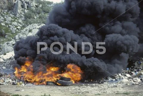 Fire In Waste Dump With Car Tires - Smoke Emission Spain