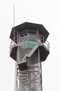 Fire watchtower with guard in the cabin Stock Photos