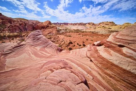 Fire Wave Sandstone Patterns in Sunlit Valley of Fire Desert Scene Stock Photos