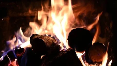Fire wood burning in a fire place Stock Footage 99602640
