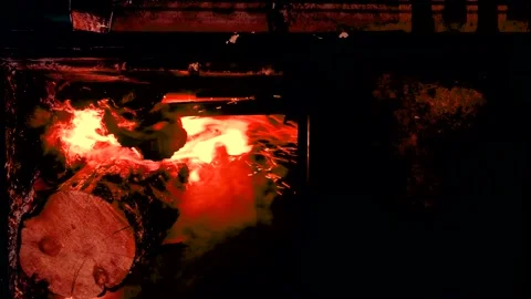 Fire of wood logs burning to make a barbecue. 4K footage Stock Footage 178094531