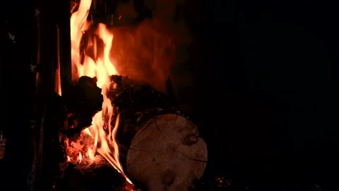 Fire of wood logs burning to make a barbecue. 4K footage Stock Footage 178094545