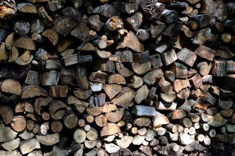 Fire wood stack on sunny day cut wood pattern	 Stock Photos