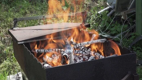 Fire on woods in BBQ Stock Footage 89845791