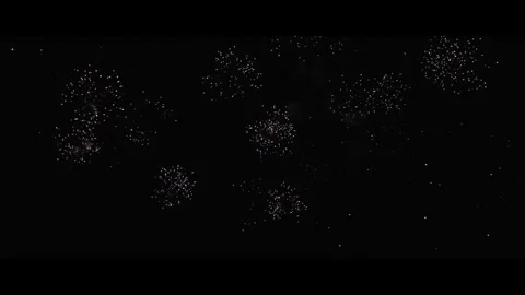Fire works at night sky, close up for one minute Stock Footage 294010312