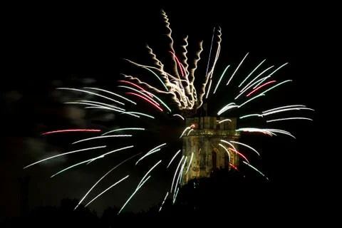 Fire works rays around St. Rumbold's Tower. Stock Photos