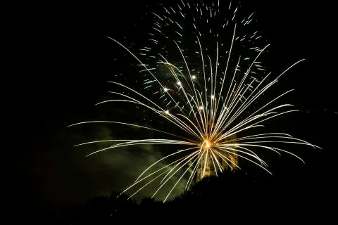 Fire works rays coming from St. Rumbold's Tower. Stock Photos