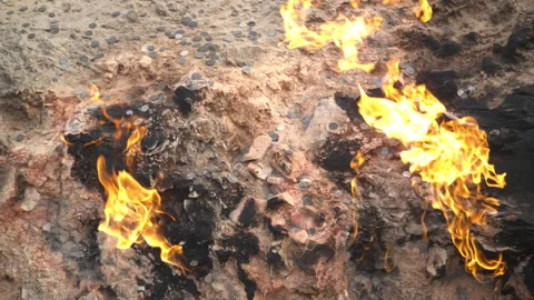 Fire in Yanar Dagh, Azerbaijan - perpetually burning mountain, natural gas flame Stock Footage 322077007