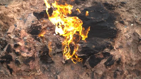 Fire in Yanar Dagh, Azerbaijan - perpetually burning mountain, natural gas flame Stock Footage 322093590