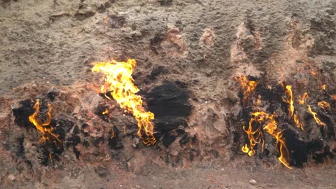 Fire in Yanar Dagh, Azerbaijan - perpetually burning mountain, natural gas flame Stock Footage 322099055