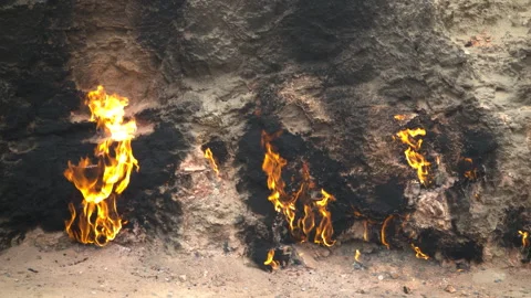 Fire in Yanar Dagh, Azerbaijan - perpetually burning mountain, natural gas flame Stock Footage 322101459