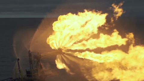 Fire. Yellow-brown flame. Torch is lit. Annealing of associated gas. Burner for Stock Footage 165177236