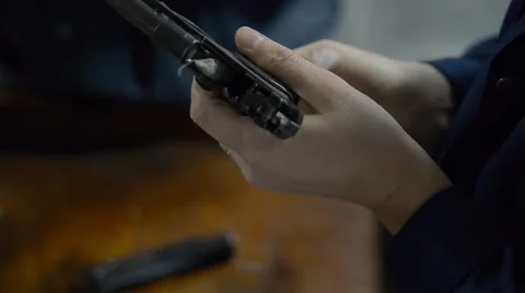 Firearm dis-assembly for cleaning and safety check of handheld gun Vidéo 62447800