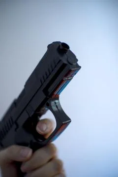 Firearm held by a man Stock Photos